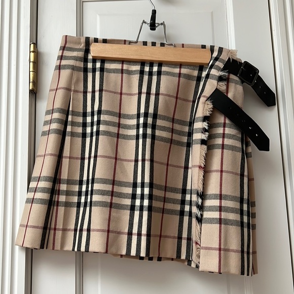 Burberry Dresses & Skirts - BURBERRY pleated mini skirt with black leather side straps